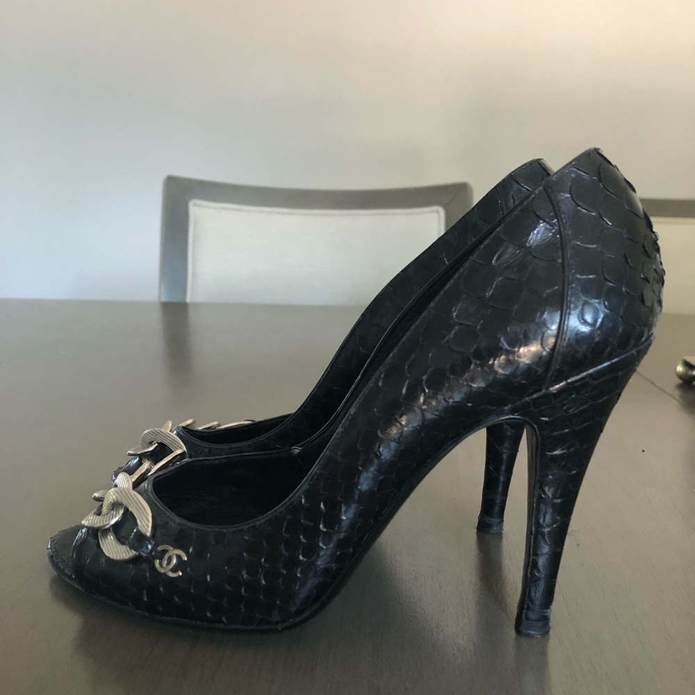 CHANEL black python peep toe pumps. Silver chain & interlocking cc logo.